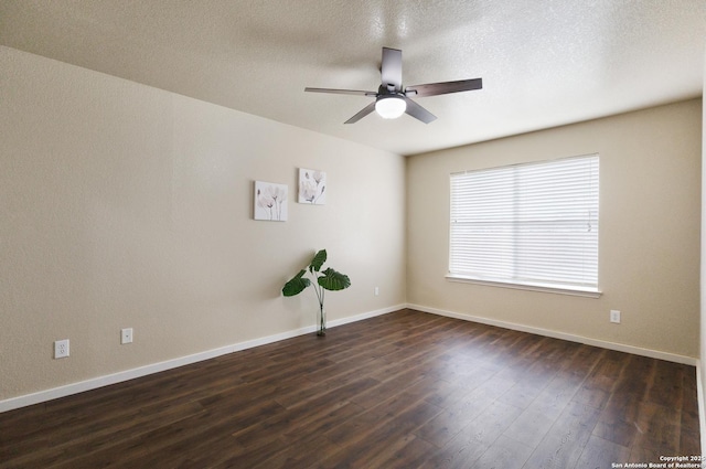 10022 Carswell Peak, San Antonio, TX 78245 - empty room featuring dark wood-type flooring, a textured ceiling, baseboards, and ceiling fan