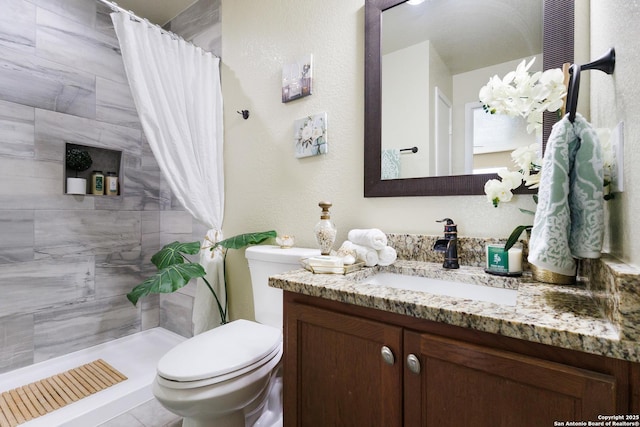 10022 Carswell Peak, San Antonio, TX 78245 - full bath featuring vanity, toilet, and tiled shower