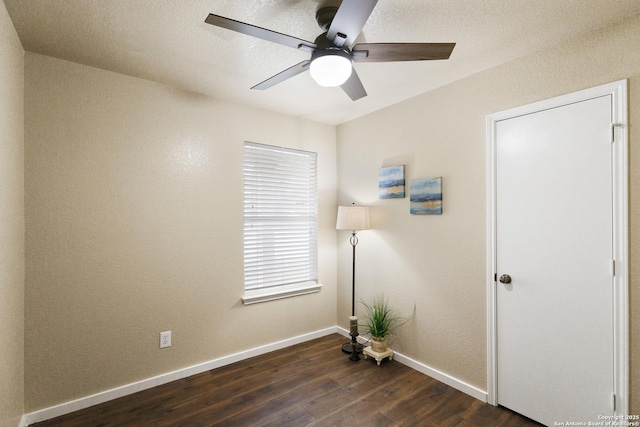 10022 Carswell Peak, San Antonio, TX 78245 - empty room with baseboards, ceiling fan, and dark wood finished floors
