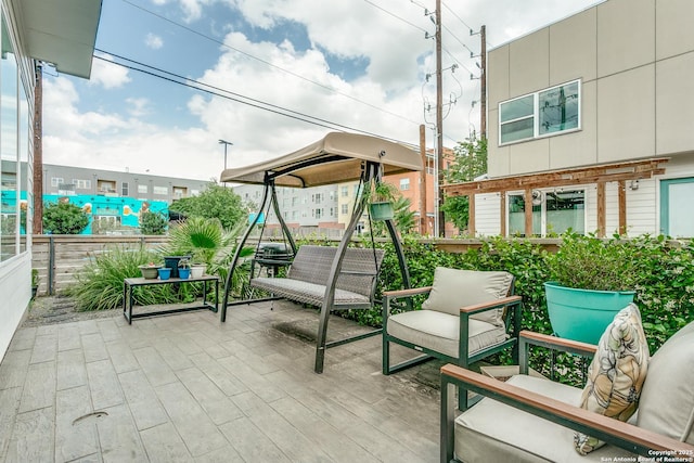 view of patio with fence