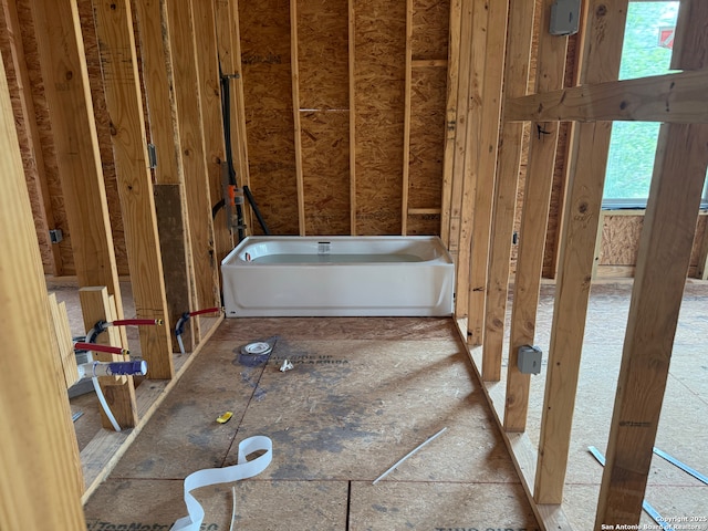 bathroom with a washtub