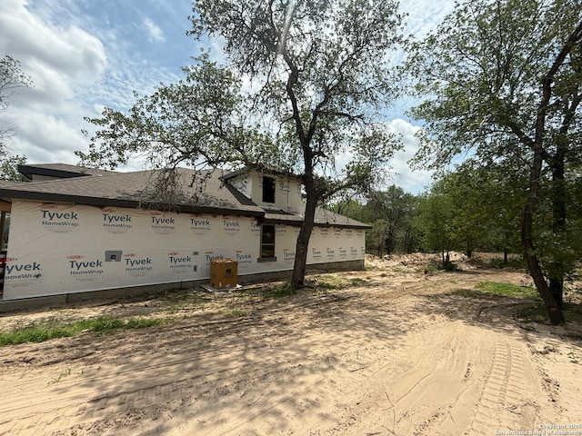 view of home's exterior with driveway