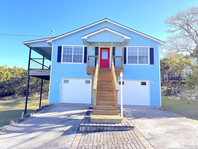726 Barbara Dr, Canyon Lake, TX 78133 - view of front of house featuring an attached garage and aphalt driveway