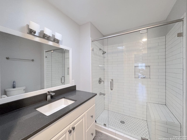 726 Barbara Dr, Canyon Lake, TX 78133 - bathroom featuring vanity, a stall shower, and toilet