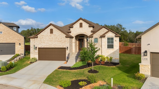 french country home with fence, stone siding, a front yard, central air condition unit, and driveway