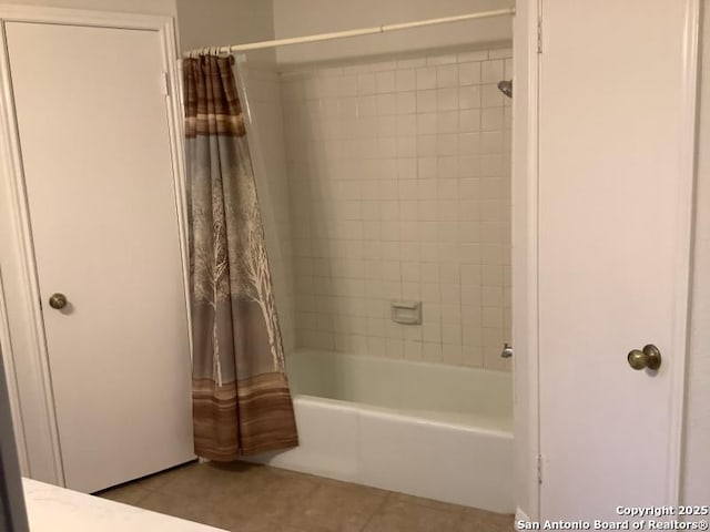 full bath featuring tile patterned floors and shower / bath combination with curtain