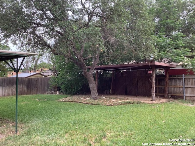 view of yard featuring fence