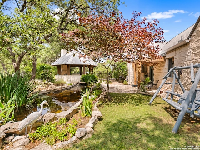 view of yard featuring a patio and a gazebo