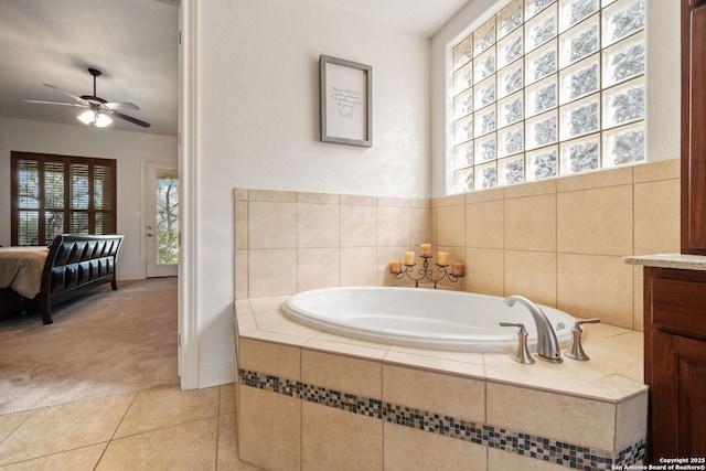 30406 Saddleridge, Bulverde, TX 78163 - ensuite bathroom featuring a ceiling fan, ensuite bath, a bath, and tile patterned floors