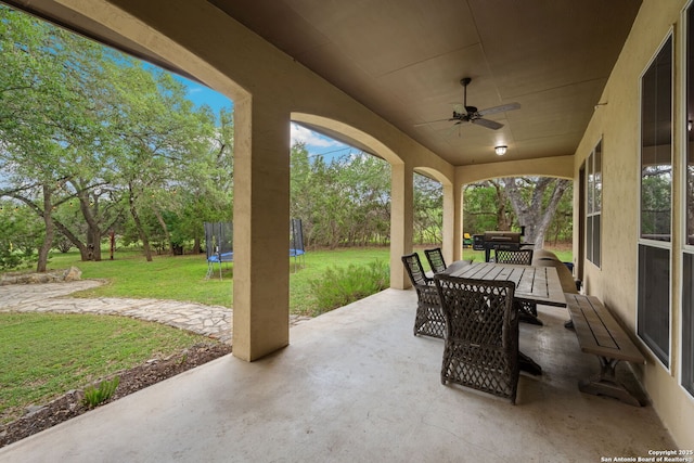 30406 Saddleridge, Bulverde, TX 78163 - view of patio / terrace featuring a ceiling fan, a trampoline, and outdoor dining space