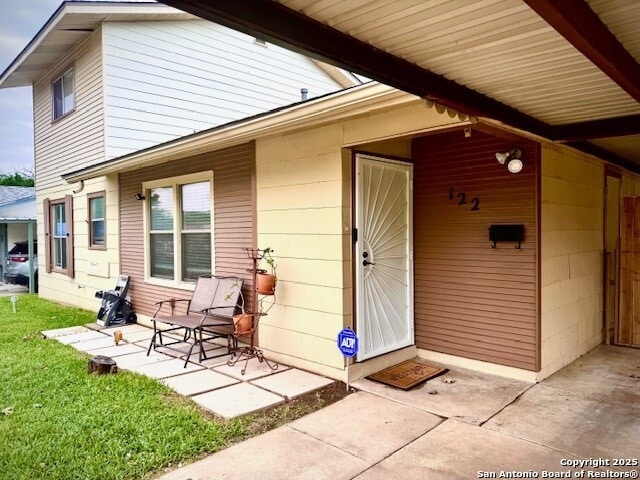 122 Hartford Ave, San Antonio, TX 78223 - exterior space with a lawn and a patio