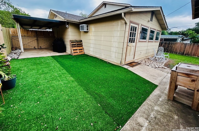 122 Hartford Ave, San Antonio, TX 78223 - rear view of property with a lawn and fence