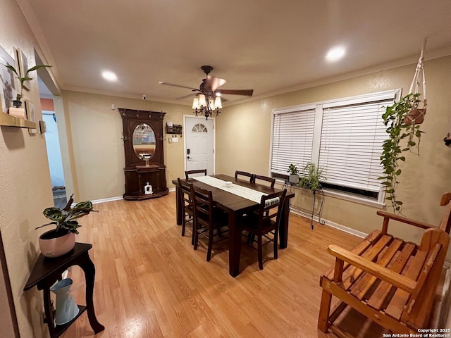 122 Hartford Ave, San Antonio, TX 78223 - dining room with a ceiling fan, baseboards, ornamental molding, and light wood-style flooring