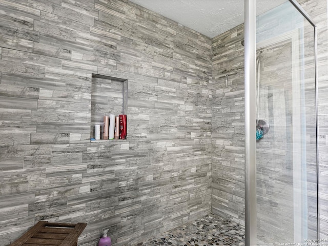 bathroom featuring a stall shower