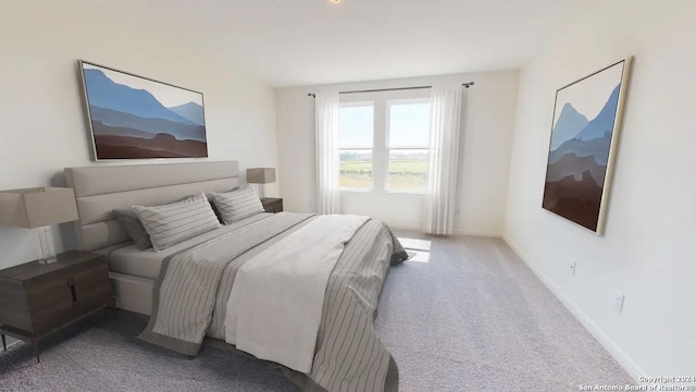 bedroom featuring baseboards and light colored carpet