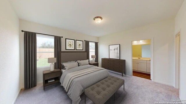 7724 Fern Pass, San Antonio, TX 78252 - carpeted bedroom featuring ensuite bathroom and baseboards
