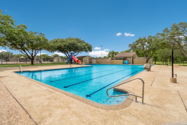 pool featuring fence