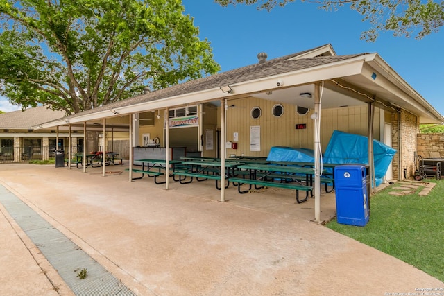 view of patio / terrace featuring fence