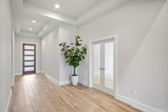 3818 Cualquiera, San Antonio, TX 78261 - foyer with light wood-style flooring, a raised ceiling, french doors, and recessed lighting