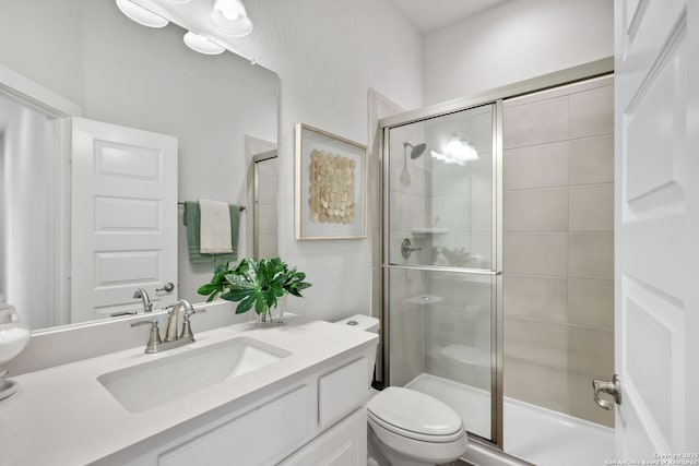 3818 Cualquiera, San Antonio, TX 78261 - bathroom featuring a shower stall, toilet, and vanity