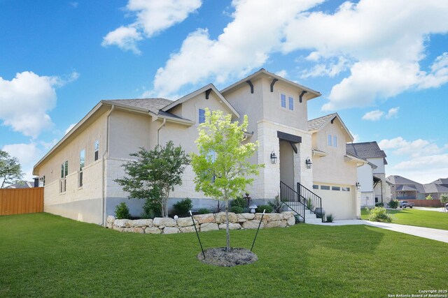 3818 Cualquiera, San Antonio, TX 78261 - view of front of house with a garage, driveway, and stucco siding