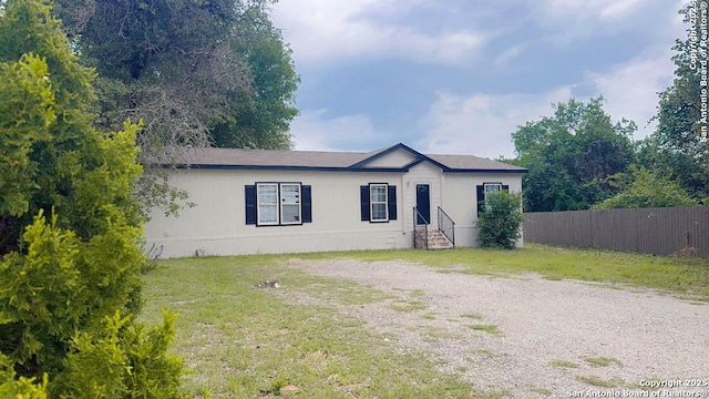 22902 Sweet Liberty, San Antonio, TX 78112 - view of front facade with entry steps, fence, and a front yard