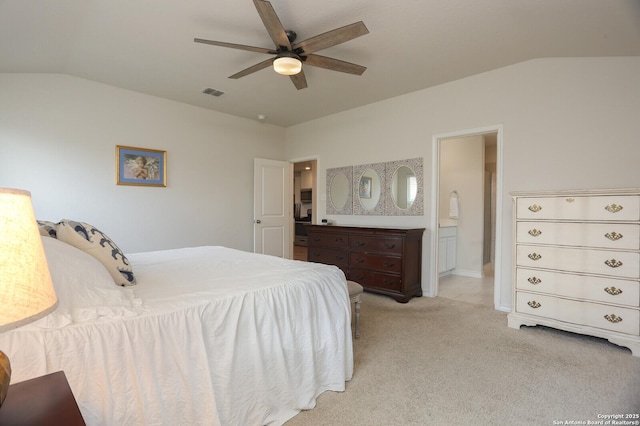 bedroom with ceiling fan, vaulted ceiling, light carpet, and visible vents