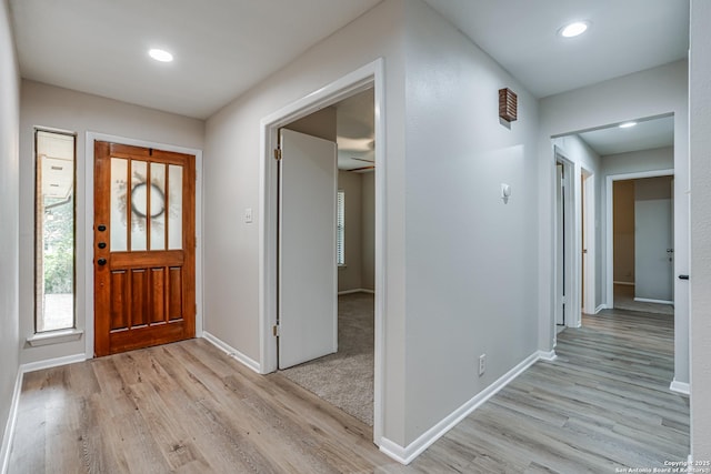 foyer entrance featuring recessed lighting, baseboards, a ceiling fan, and light wood-type flooring