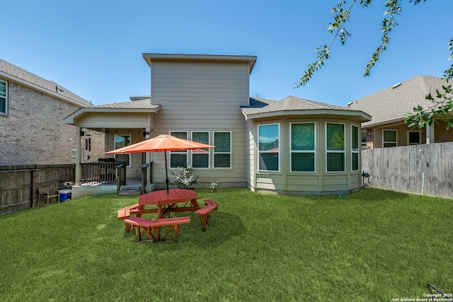13911 Lazada, San Antonio, TX 78245 - rear view of property with a shingled roof