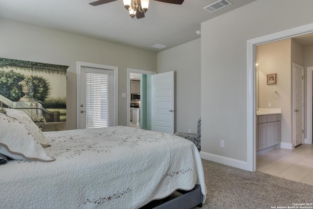 9407 Sundrop Vly, San Antonio, TX 78254 - bedroom with ceiling fan, visible vents, baseboards, light carpet, and ensuite bath