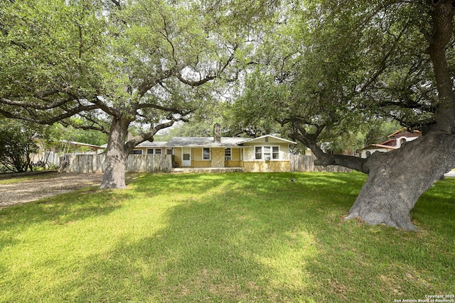 1304 Landa, New Braunfels, TX 78132 - view of front of house with fence and a front lawn