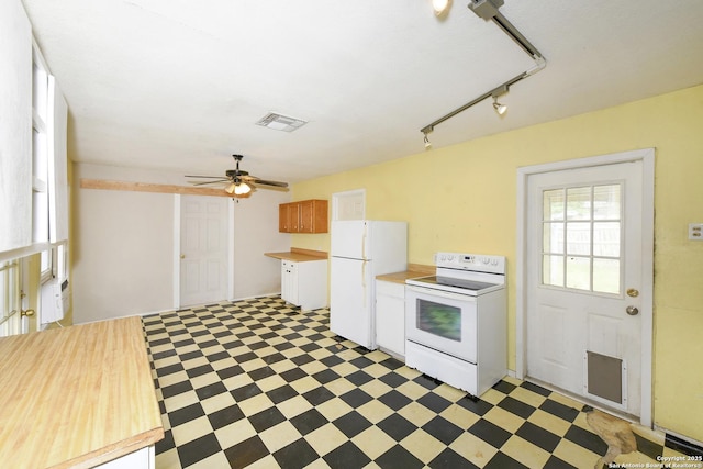 1304 Landa, New Braunfels, TX 78132 - kitchen with ceiling fan, white appliances, light countertops, light floors, and visible vents