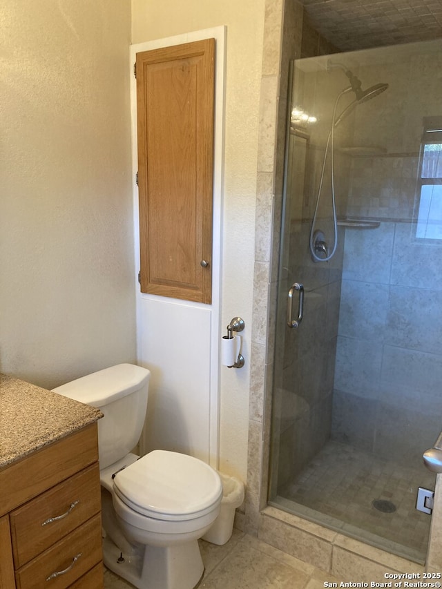 3014 War Knife, San Antonio, TX 78238 - full bath with vanity, toilet, tile patterned floors, and a stall shower