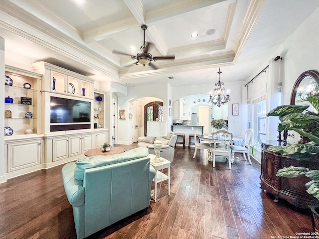 living room with beamed ceiling, dark wood-type flooring, arched walkways, coffered ceiling, and ceiling fan with notable chandelier