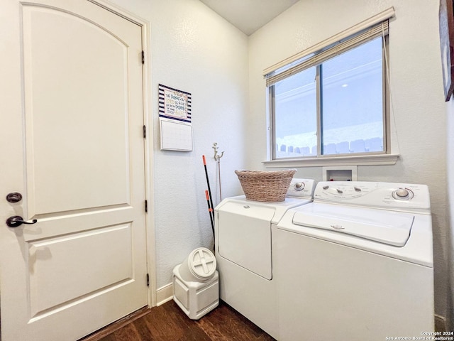 laundry room with separate washer and dryer, laundry area, dark wood-style floors, and baseboards