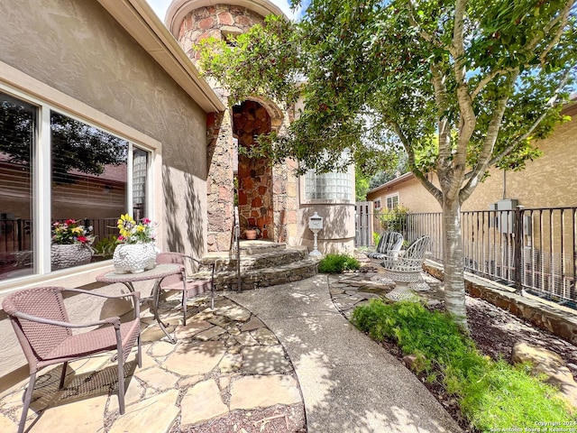 view of patio / terrace with fence