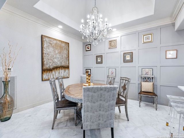 4 Waterford Gln, San Antonio, TX 78257 - dining space featuring a decorative wall, a tray ceiling, crown molding, a chandelier, and light marble finish floors