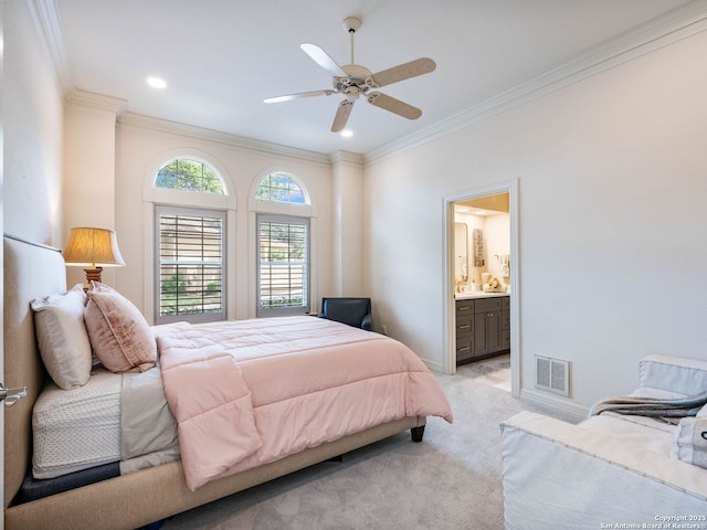 4 Waterford Gln, San Antonio, TX 78257 - bedroom featuring ornamental molding, light carpet, ensuite bath, a ceiling fan, and baseboards