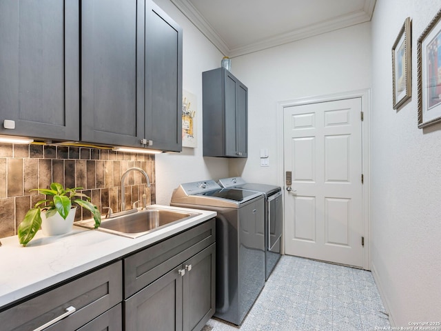 4 Waterford Gln, San Antonio, TX 78257 - clothes washing area featuring cabinet space, washing machine and dryer, crown molding, and light tile patterned floors