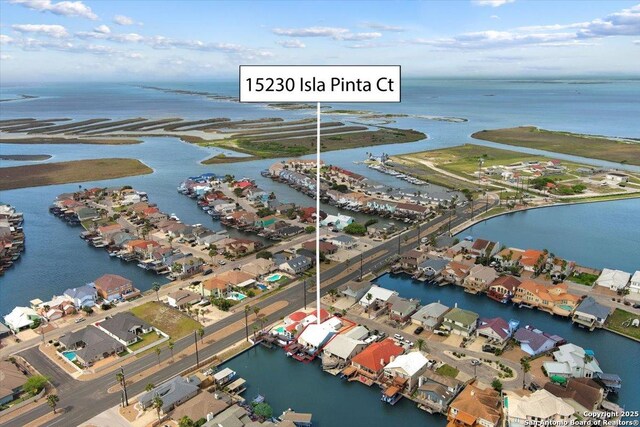 aerial view with a residential view and a water view
