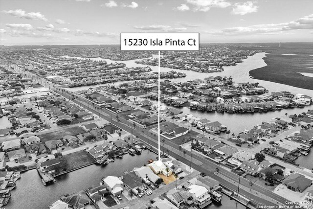 aerial view featuring a residential view and a water view