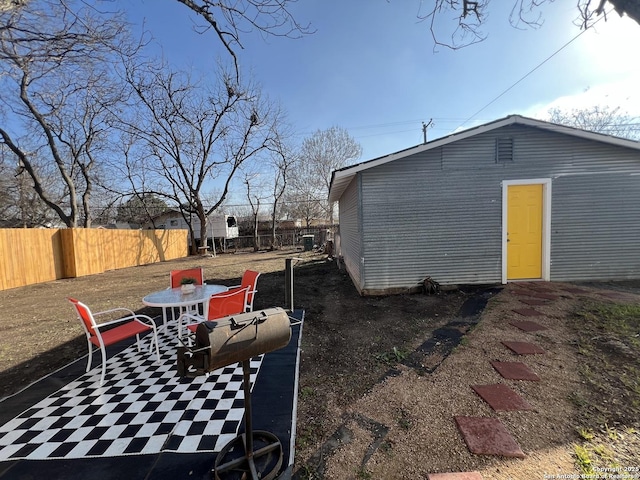 exterior space with a fenced backyard