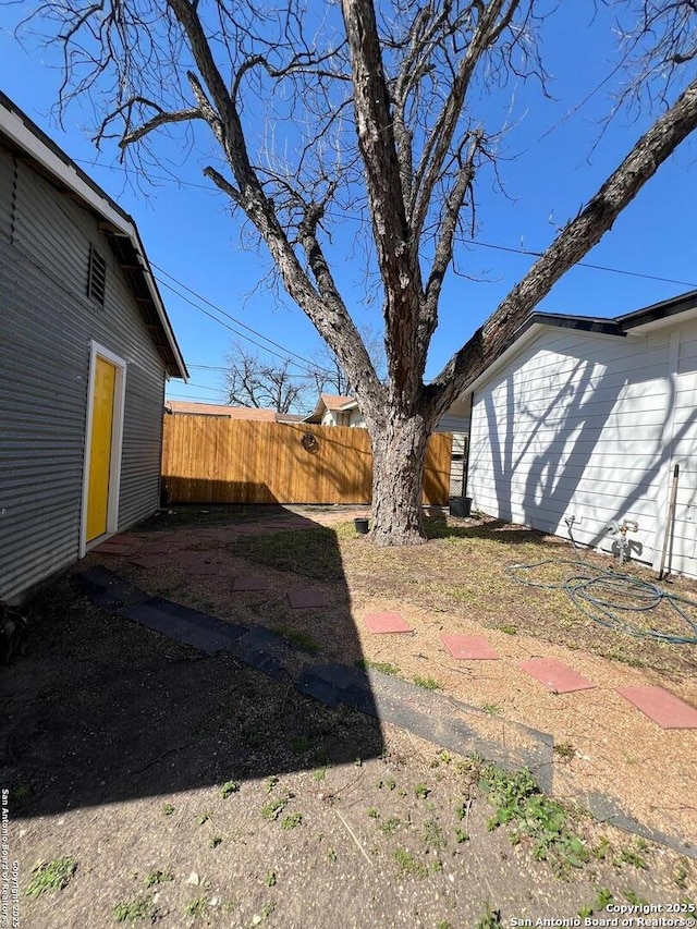 view of yard featuring fence