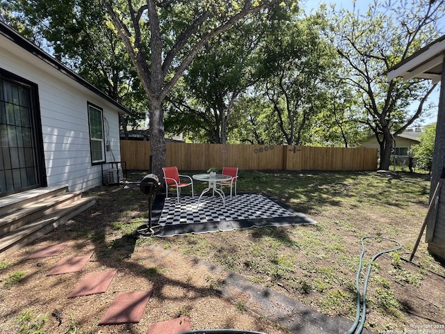 view of yard featuring a fenced backyard and a patio area