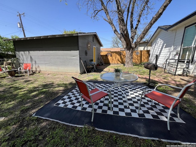 view of yard featuring a patio and fence