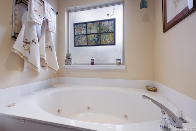 full bath featuring a whirlpool tub