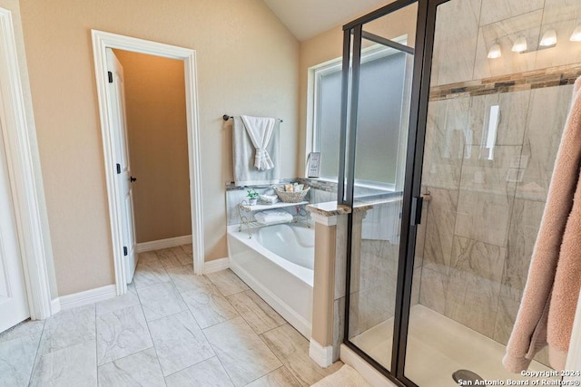 15742 Chippewa Blvd, Selma, TX 78154 - full bathroom with baseboards, a shower stall, a garden tub, and marble finish floor