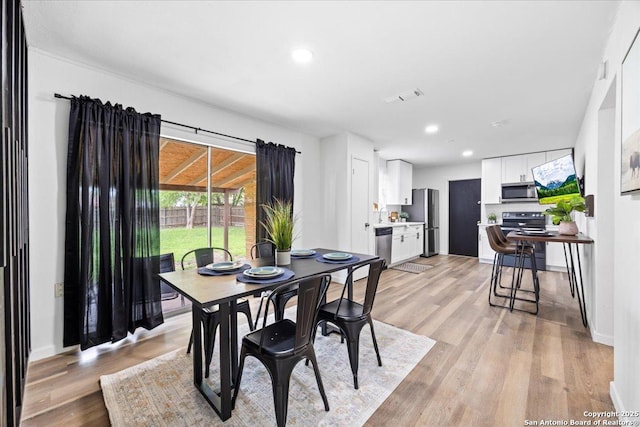 7722 Strolling Ln, Live Oak, TX 78233 - dining area with recessed lighting, baseboards, and light wood finished floors