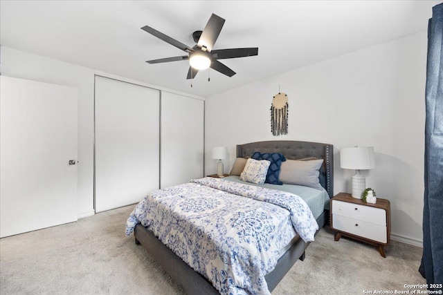 7722 Strolling Ln, Live Oak, TX 78233 - carpeted bedroom with ceiling fan and a closet