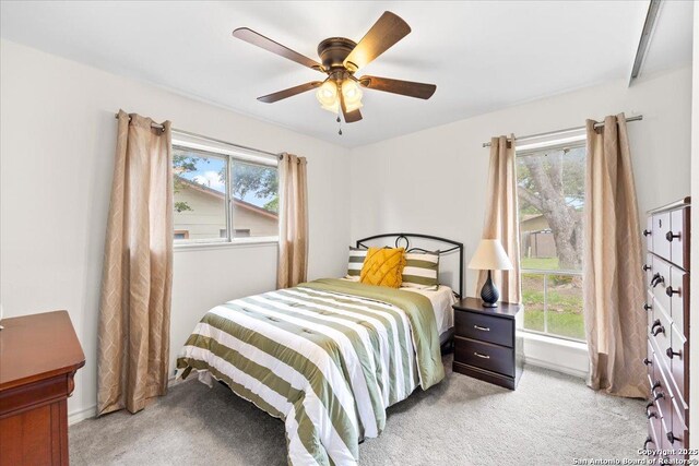 7722 Strolling Ln, Live Oak, TX 78233 - bedroom featuring a ceiling fan and light colored carpet